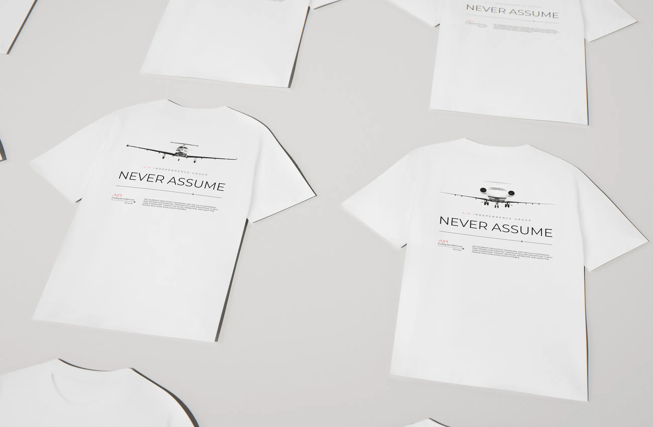 Weiße T-Shirts der Air Independence Group im Raster, Rückenmotive mit Pilatus PC-12 und Challenger 650